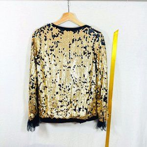 Sequin bomber with tule fringe cuffs